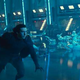 Kylo Ren and some troopers being blown away by some sick tunes from a giant speaker probably.